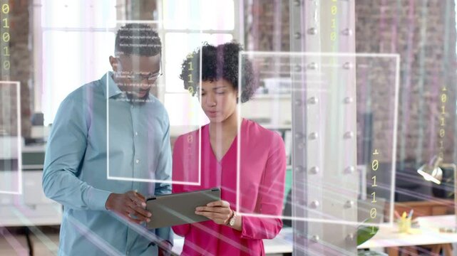 Pair holding tablet, man tapping, casting ghosted binary frames over tablet and bodies for business