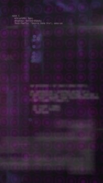 Vertical video: Rectangular display revealing code after focus shift, showing scroll, moving flare