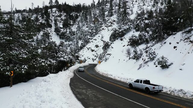 The California San Gorgonio San Bernardino Mountain Range near the Santa  Ana Watershed covered in snow along SR 38 through the Mountain Pass