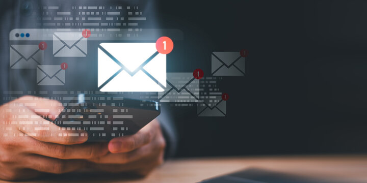 IT specialist monitors email notification system on mobile device, managing real time alerts, message delivery, inbox updates, communication flow, user engagement, and digital notification tracking
