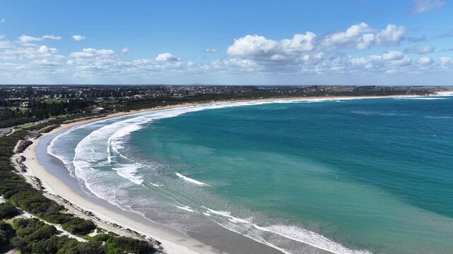 Warrnambool, Victoria, Australia: 4K aerial drone footage of coastal town, sandy beaches, ocean waves, wetlands, E Johnson Reserve, river inlets and urban landscape with houses, shops and streets