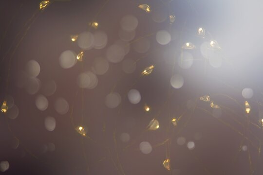 Golden string lights with special effects.