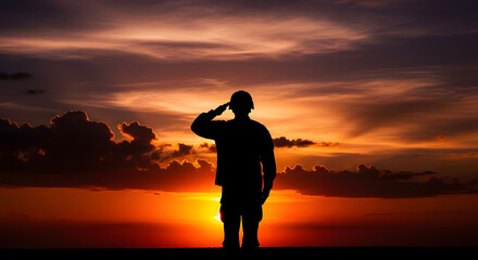 Fototapeta premium Military Soldier Silhouetted Saluting at Sunset Reflecting Patriotism and Duty During Golden Hour