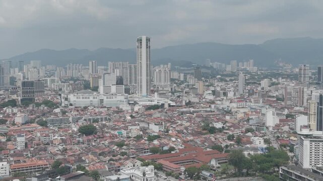 Aerial daytime view of George Town UNESCO heritage zone and Komtar tower in Penang, Malaysia