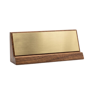 Blank brass nameplate on dark walnut wood base