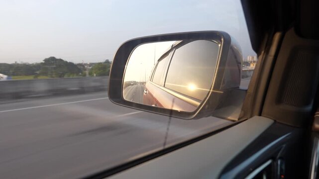 The mirror view shows motion and perspective while supporting awareness observation and visual storytelling of travel direction and leaving behind.
