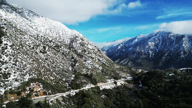 The California San Gorgonio San Bernardino Mountain Range near the Santa  Ana Watershed covered in snow along SR 38 through the Mountain Pass