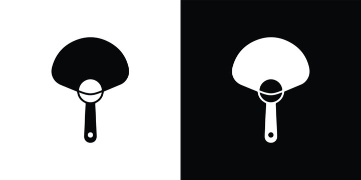 Black and white ping pong paddle on split background symbol