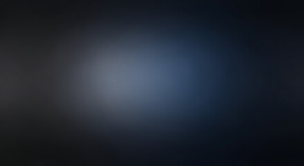 Obraz premium A gradient blue circle on a dark background with a spotlight effect