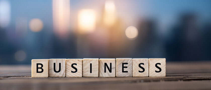 Business word letter cube wooden concept blur background office success business word wooden cube with blurred city background, creative corporate