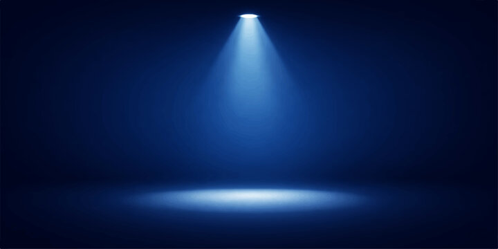 A bright blue spotlight shines on a dark theater stage, creating an illuminated glow against a black backdrop design for a night show scene