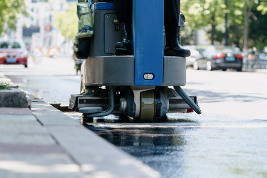 The automatic sweeper is cleaning the city streets
