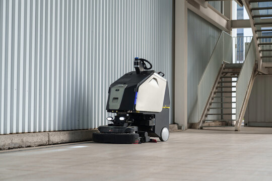 The automatic sweeper is cleaning the city streets