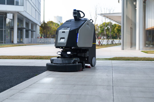 The automatic sweeper is cleaning the city streets