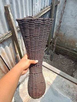 Traditional Woven Fish Trap On Hand, Bubu