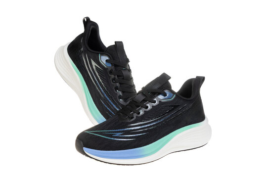 Pair of black athletic running sneakers isolated on white. Stylish athletic sneakers for fitness, training, and an active lifestyle. Product photography for e-commerce.