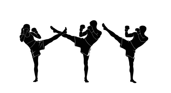 Silhouette of people kicking high.
