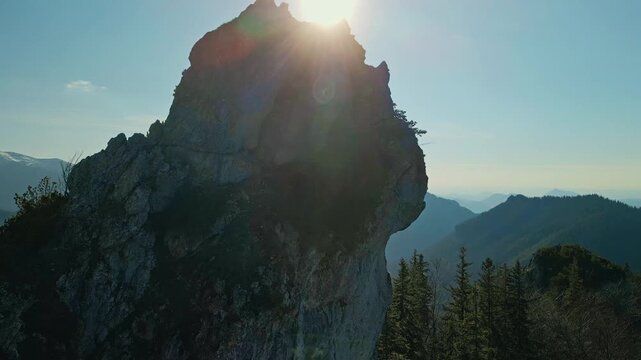 Sunlit Jagged Mountain Summits. Bright Sunlight Highlights Craggy Pinnacles Above Forest Of Pin Oaks