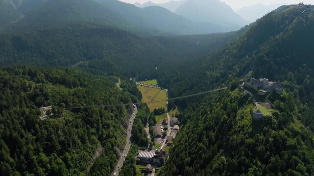 Drone shot of Ehrenberg Castle and Highline 179 bridge in Austria with beautiful alpine landscape and tourism in Europe