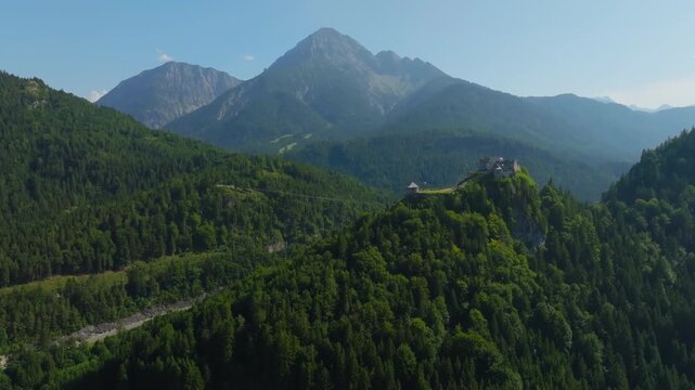 Aerial view of Ehrenberg Castle and Highline 179 bridge in Austria. Alpine mountains landscape, travel in Europe, mountain ranges.