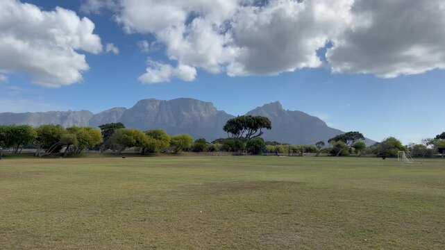 Table Mountain and Devils&rsquo;s Peak on a partly cloudy day as viewed from the Southern Suburbs.