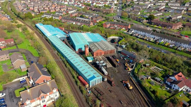 Overhead 4K 60FPS aerial video of Whitehead Railway Museum in Whitehead, County Antrim, Northern Ireland in the UK. Produced with Rec709 color.
