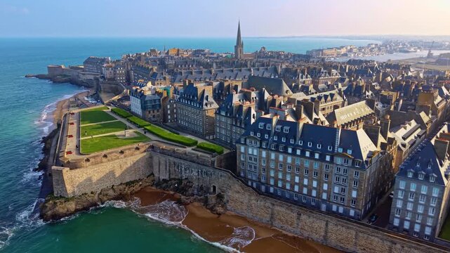 Aerial panning over Saint Malo bastion gardens and Bon Secours beach, Brittany in France