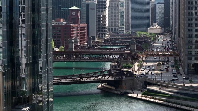 Chicago USA, Establishing Drone Shot of Downtown Traffic, River Buildings and Bridges on Sunny Day