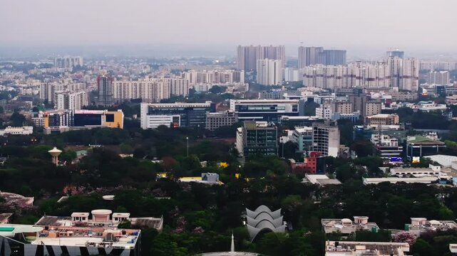 Concorde Manhattans apartments with skyscraper buildings, IT hub buildings and trees at Electronic city, Bangalore, karnataka, india. day time, push back shot, drone shot, 4k.
