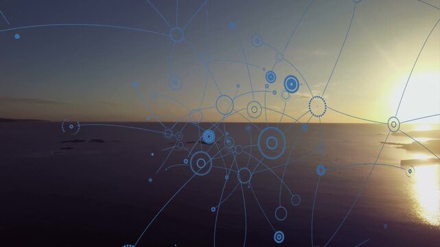 Blue network starting when one circle appearing, multiplying rings and arcs, showing links over sea