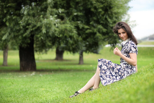 Beautiful girl in dresses for a walk