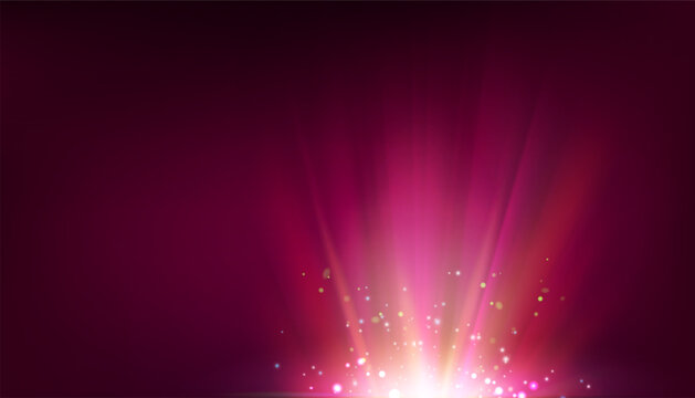 Bright light burst with radial rays on dark background