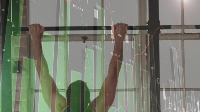 Man gripping pullup bar completing set for strength leaning on post as finance charts obscuring him