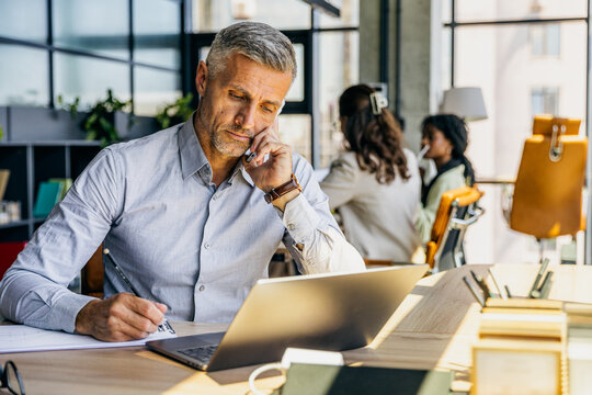 Recruitment specialist analyzing candidate profiles in serene workspace