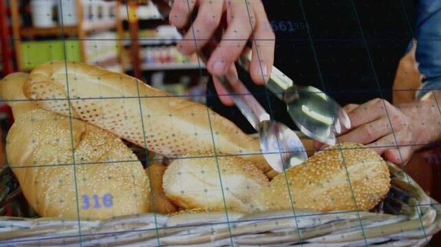 Baker using tongs in bakery, probing, clamping, lifting seeded roll, selecting while grid showing %