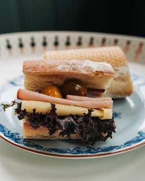 close up of a sourdough sandwich on a plate in a cafe