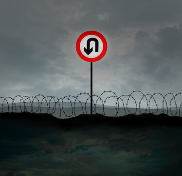 Return sign and barbed wire symbolizing refugee crisis