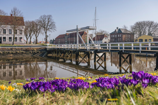 Historic drawbridge and warehouse in T�nning during spring