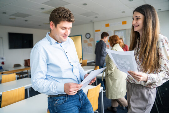 Students discussing in a multicultural classroom setting