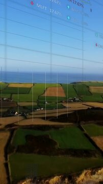 Vertical video: HUD activating as grids pulsing, showing data over coastal farms to map crop value