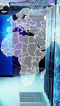 Vertical video: On data ping, map overlay drawing borders over server aisle, showing network load