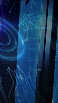 Vertical video: Vertical mesh display powering on, rotating HUD and flowing circuits showing status