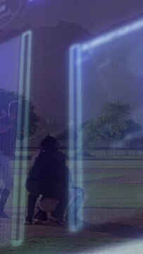 Vertical video: Baseball catcher rising as pitch prompts batter swinging bat to first blue overlay