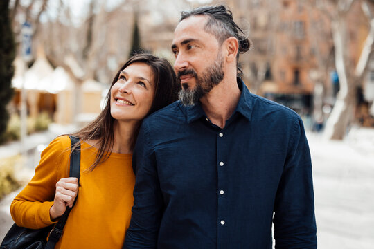 Smiling woman enjoying leisure time with man