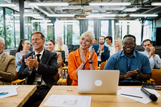 Cinematic image of a conference meeting.