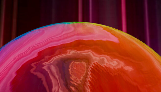 Colorful abstract macro of dynamic liquid surface with energy