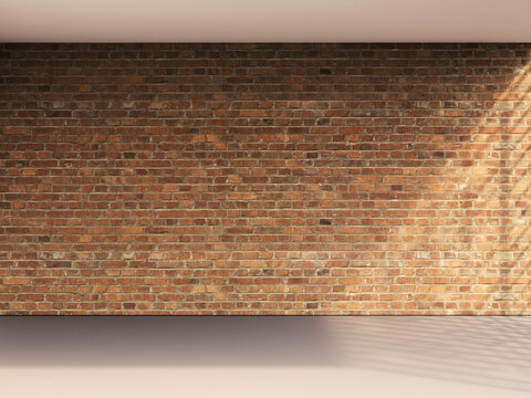 Empty modern room indoors with red brick wall and sunlight