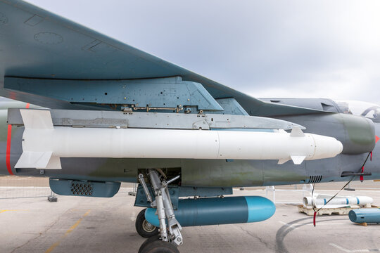 Air to surface guided missile with TV optical guidance sensor under fighter jet wing