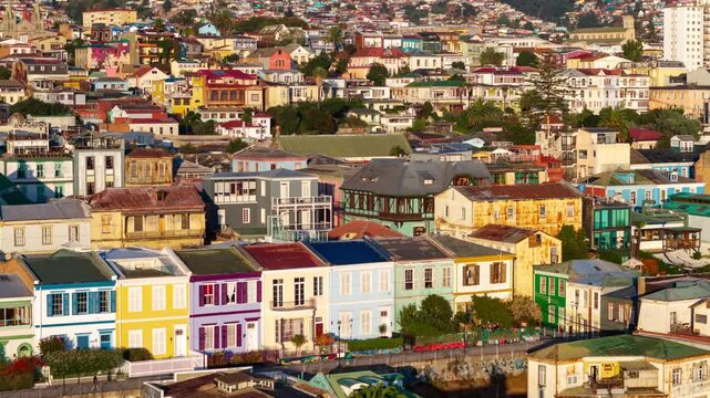 Aerial hyperlapse with parallax effect of Atkinson Promenade, featuring Cerro Alegre and Concepci&oacute;n in the background, and the colorful historic architecture of Valparaiso, Chile