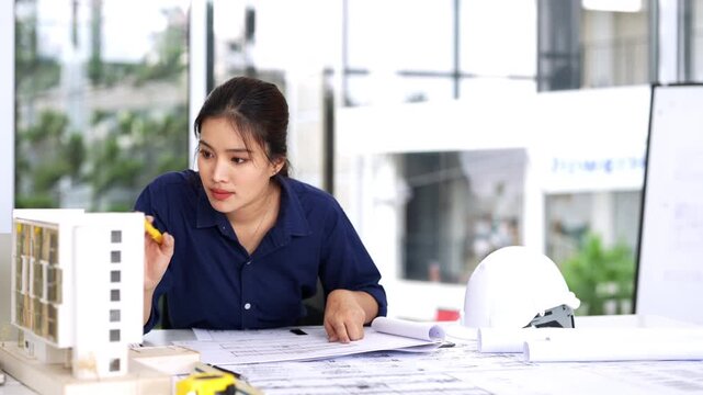 Enginee working with drawings inspection reviews  shop drawing construction Blueprint. Engineer, Architectural concept.